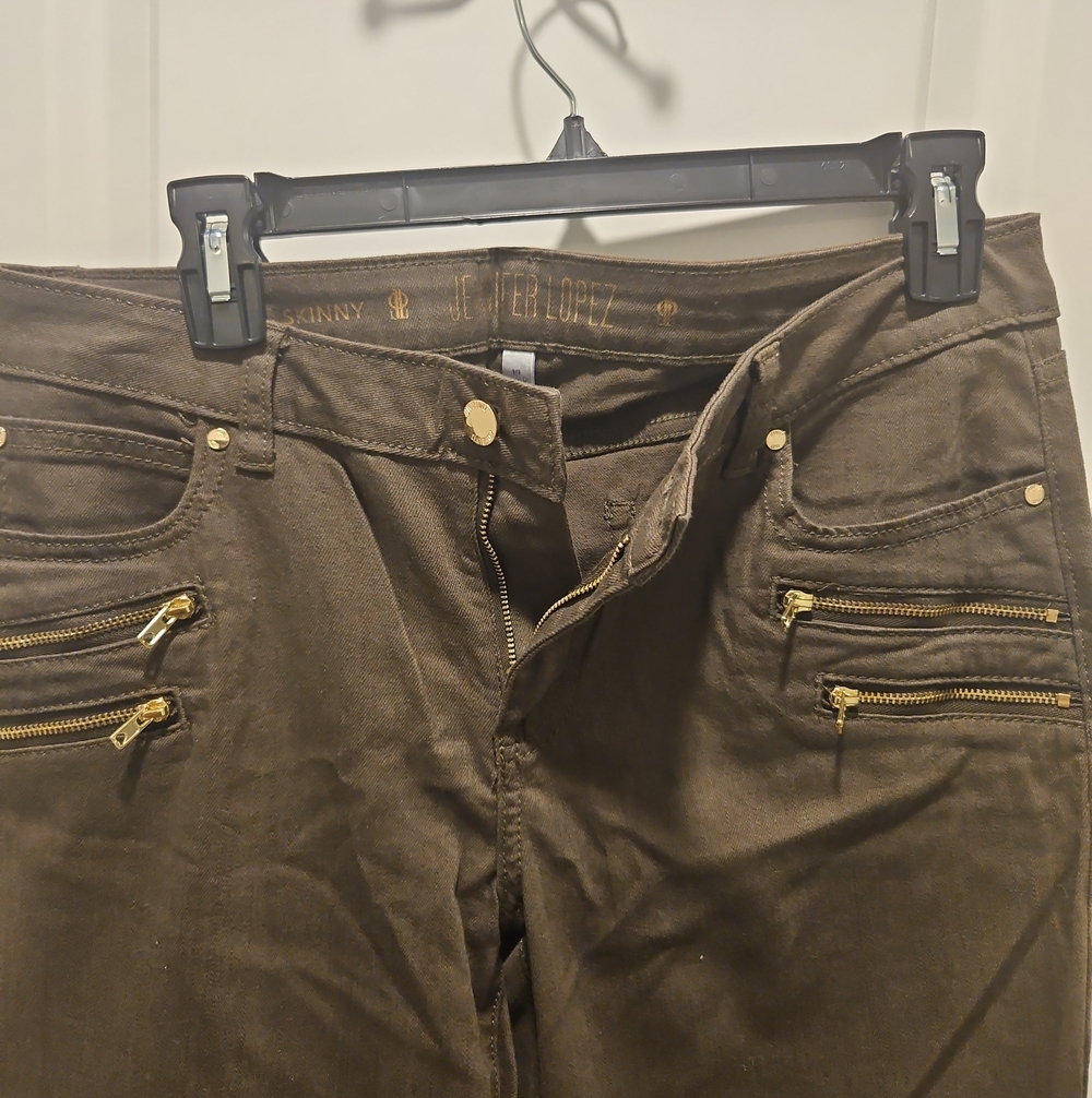Jennifer Lopez Brown Skinny Jeans with Gold Zippers